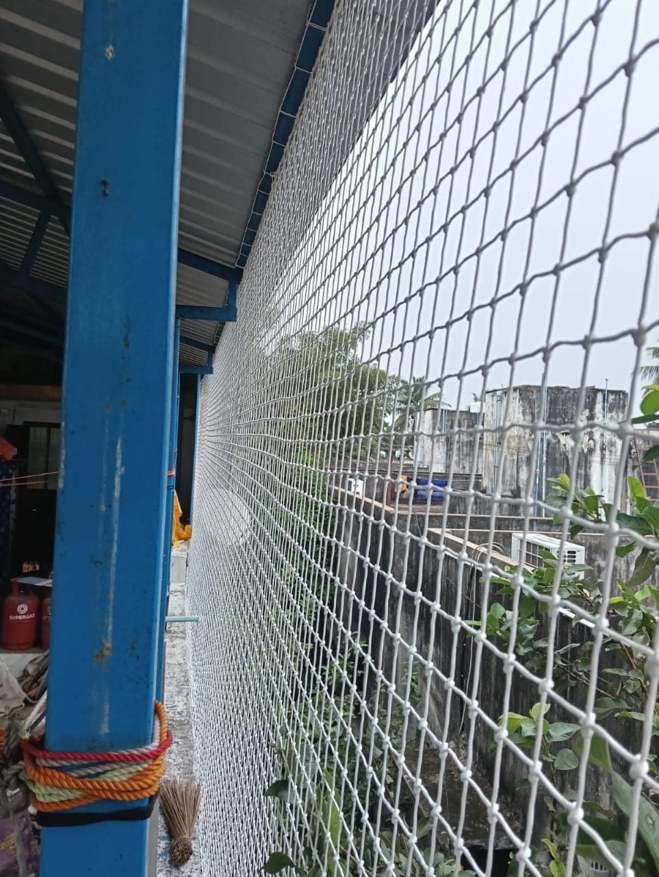 Invisible grill installation in Chennai by Poorna Enterprises